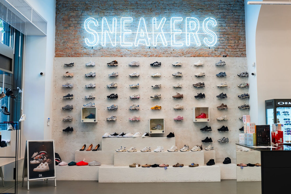 The SNEAKERS wall with ASICS, New Balance and Onitsuka Tiger models